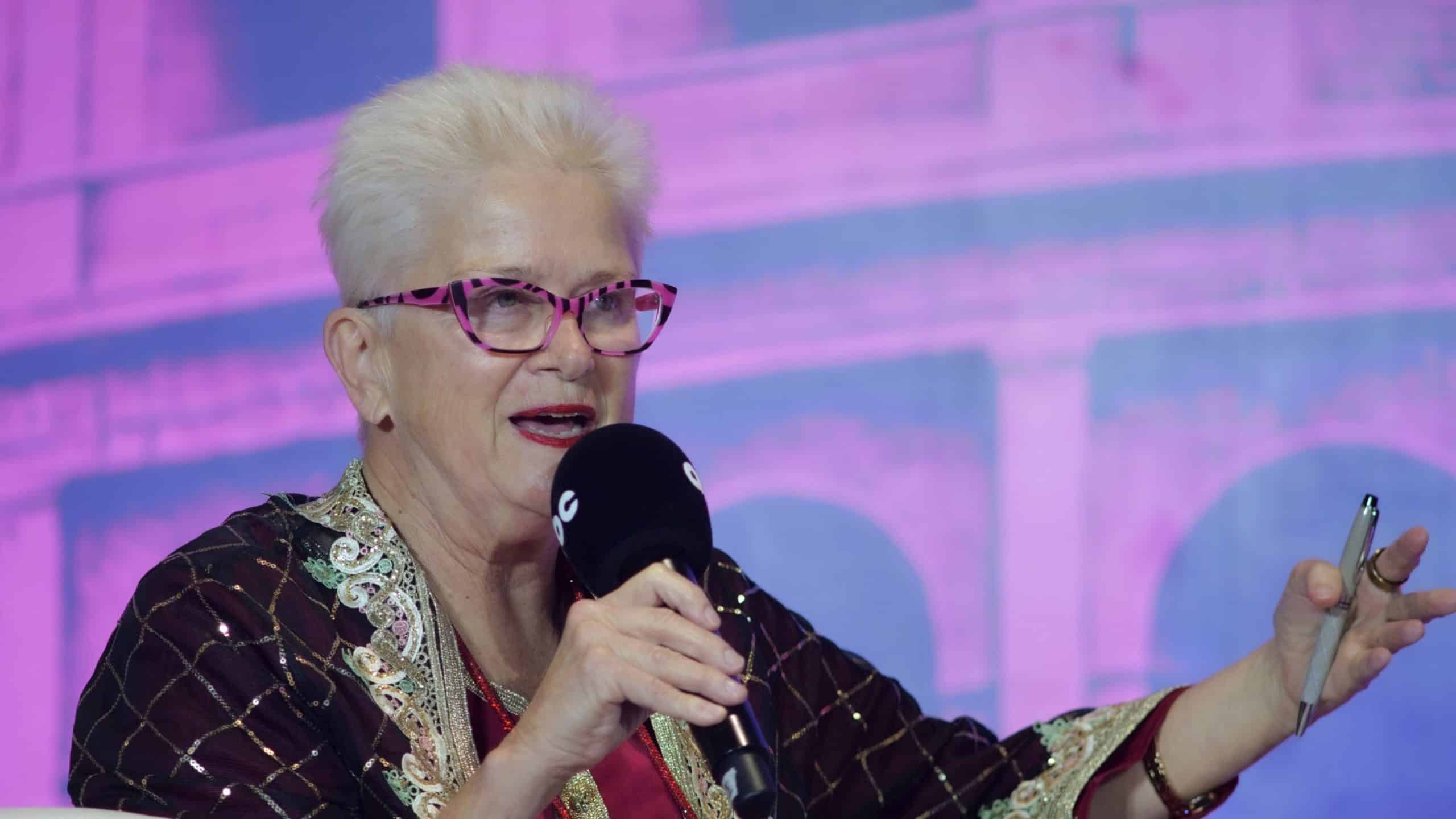 Dr Jane Thomason, Emeritus Chair of the World Metaverse Council, guiding the panel discussion with key questions